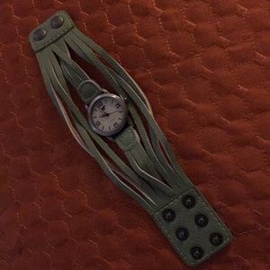 Lime colored leather cuff watch.